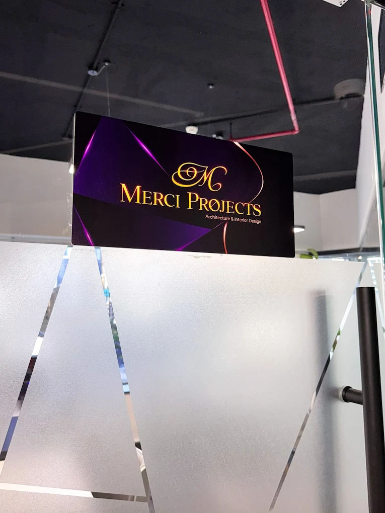 Merci Projects Architecture and Interior Design sign at the studio entrance