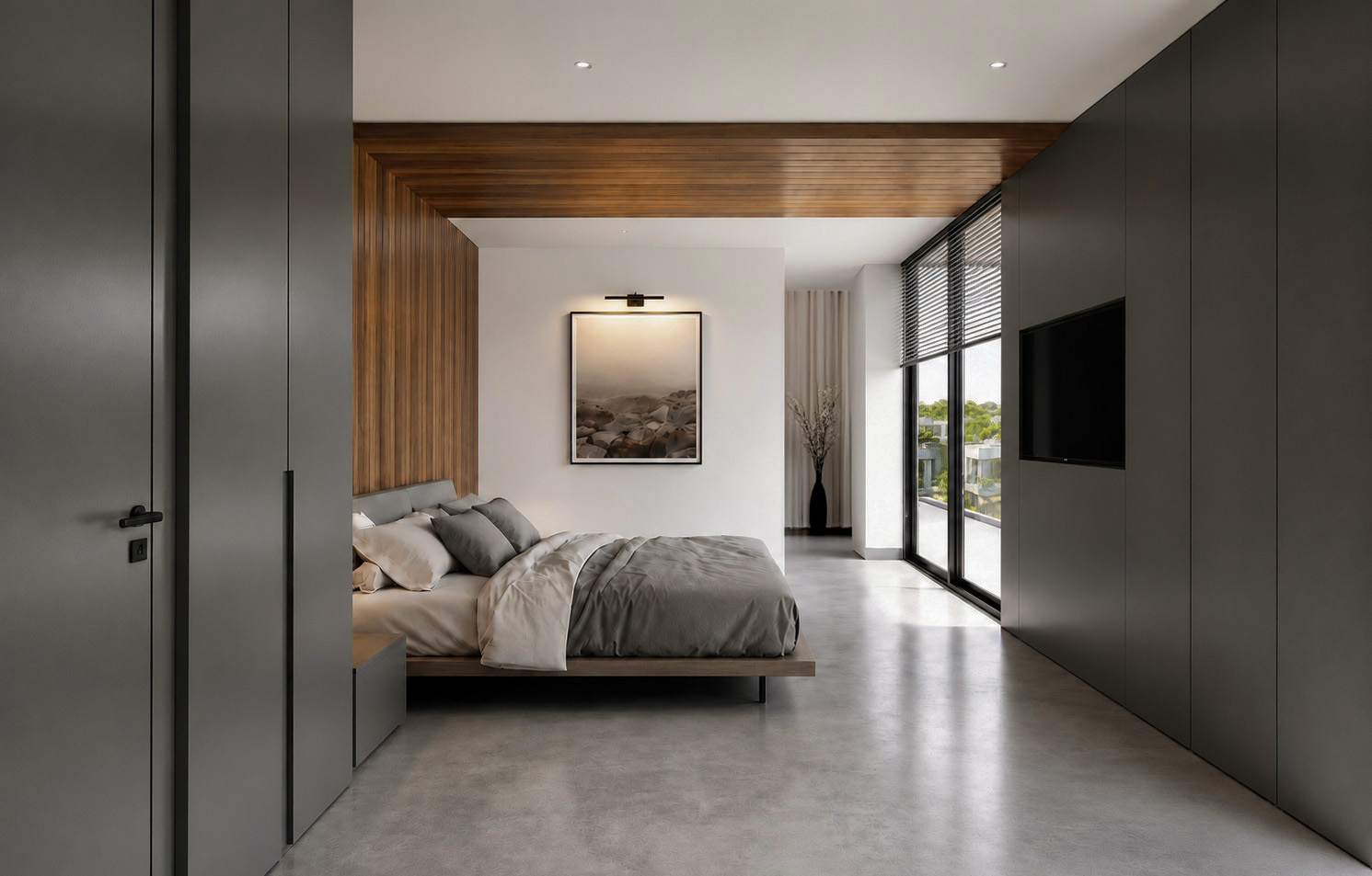 Wadi Al Shabak Private Villa bedroom with dark fitted cabinetry