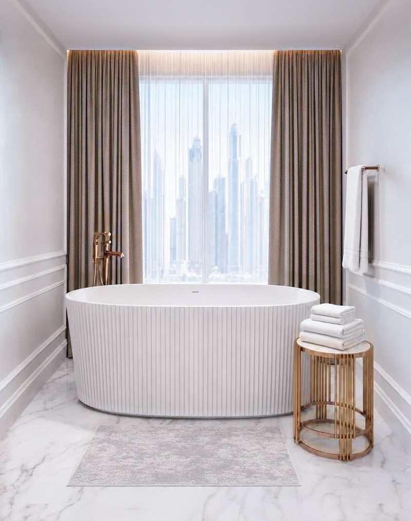 Bathroom with freestanding bathtub and Dubai Marina view