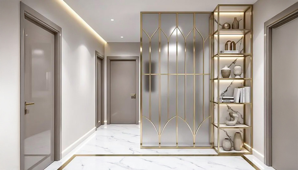 Elegant hallway with decorative brass screen and illuminated shelving